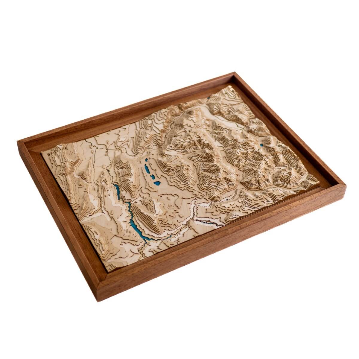 Tableau du massif du Taillefer en relief avec une eau bleue marine